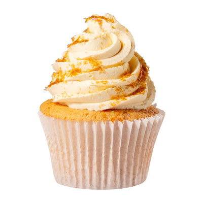 Vaniljcupcake med generös frosting dekorerad med guldglitter från PME Magic Sparkles.