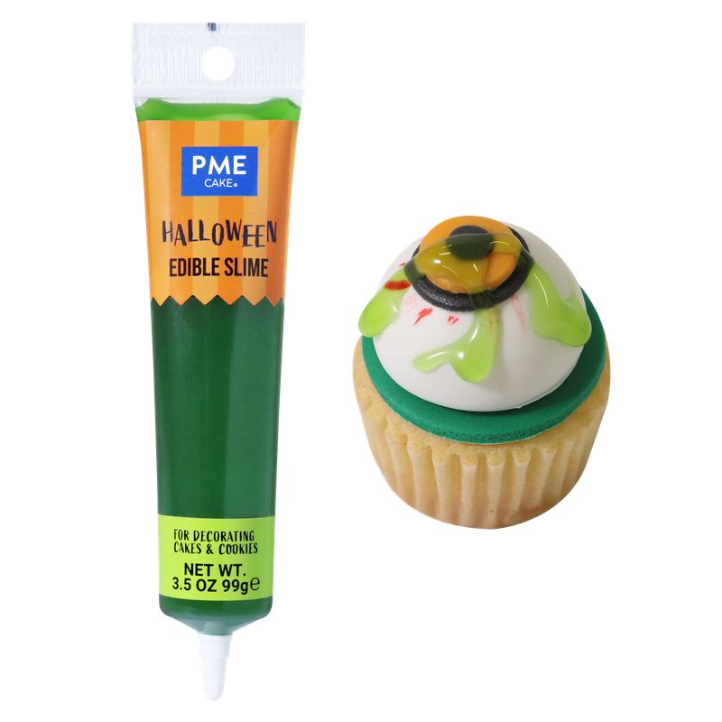 Grönt ätbart Halloween-slime från PME på cupcake med ögongodis