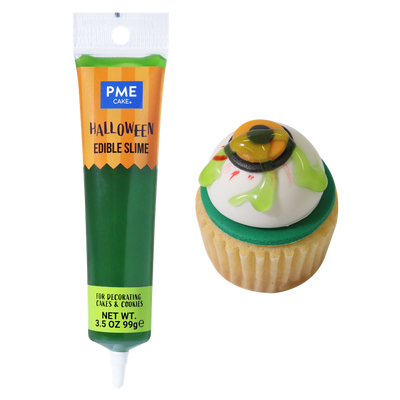 Grönt ätbart Halloween-slime från PME på cupcake med ögongodis