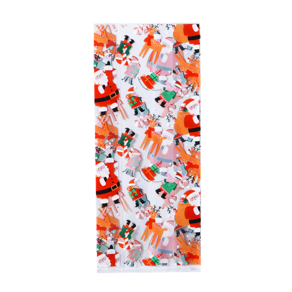 Närbild på godispåse med jultema och guldigt påsförslut