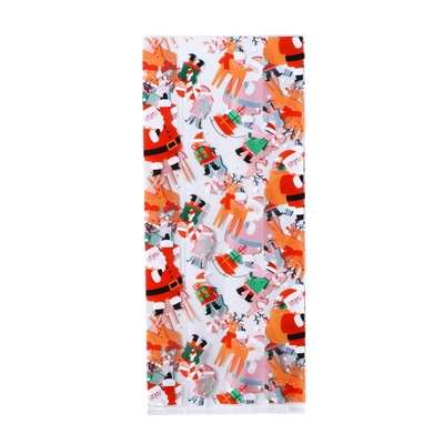 Närbild på godispåse med jultema och guldigt påsförslut