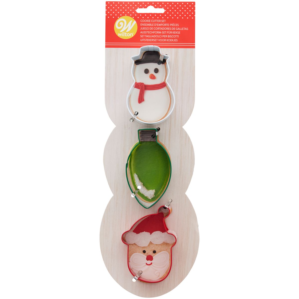 Pepparkaksformar i jultema med en snögubbe, julkula och jultomte