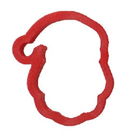 Röd pepparkaksform i plast formad som en jultomte mot vit bakgrund