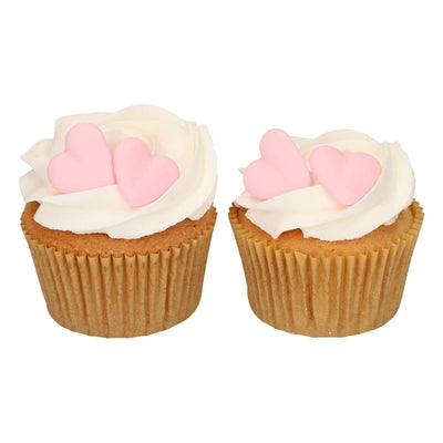 Cupcakes dekorerade med rosa hjärtan