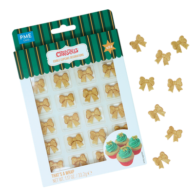 Ätbar tårtdekoration i form av guldiga rosetter