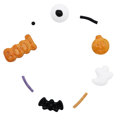 Strössel i form av ögon, pumpor, spöken, fladdermöss och texten "boo!"