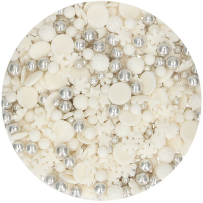 Strössel i form av vita och silvriga pärlor, snöflingor, stjärnor och konfetti