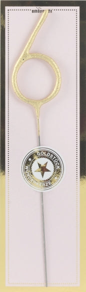 Sifferbloss i form av guldigt nummer 6 mot ljus bakgrund