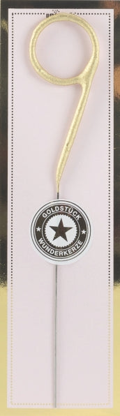 Sifferbloss i form av guldigt nummer 9 mot ljus bakgrund