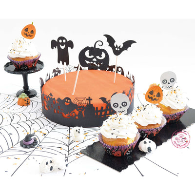 Tårtdekorationskit med wrappers och cake topper i Halloweenmotiv på bakverk