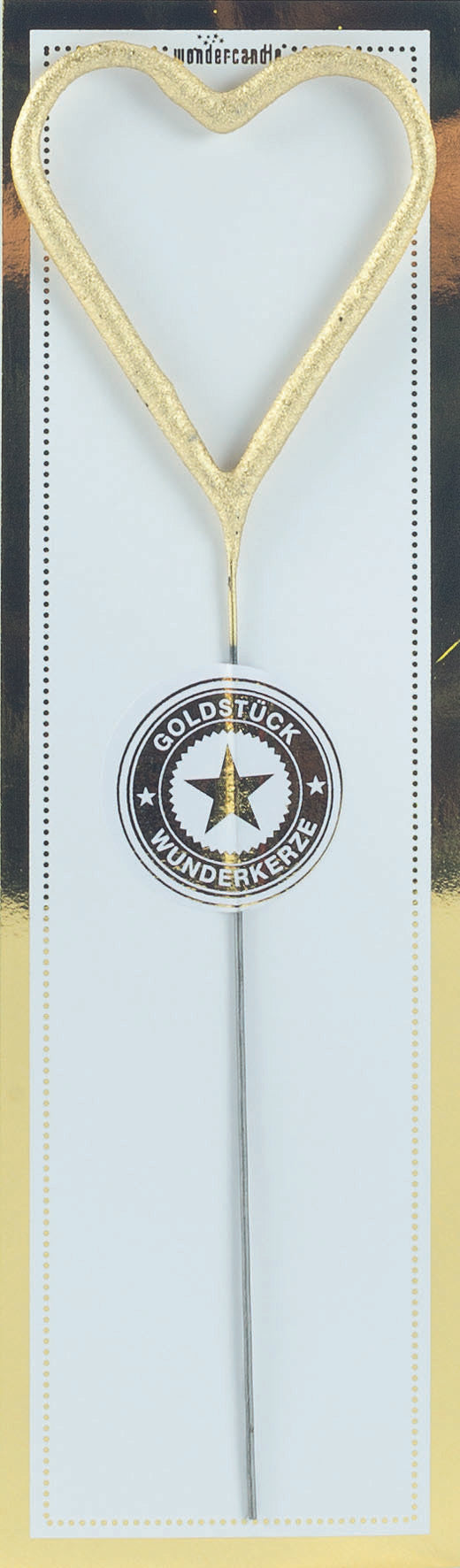 Tomtebloss i hjärtform i guldig färg från Wondercandle i förpackning.